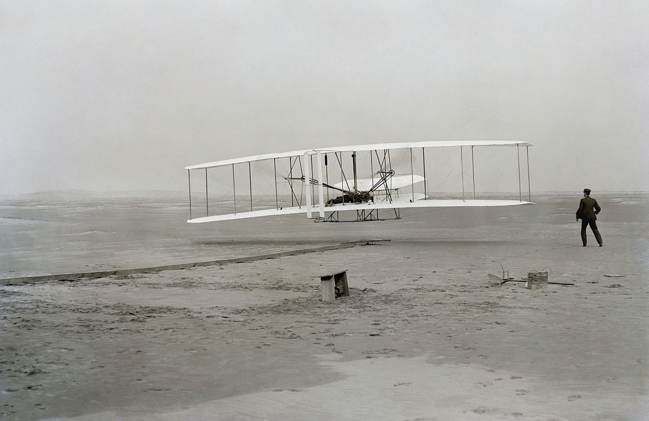 First successful flight of the Wright Flyer, by the Wright brothers.