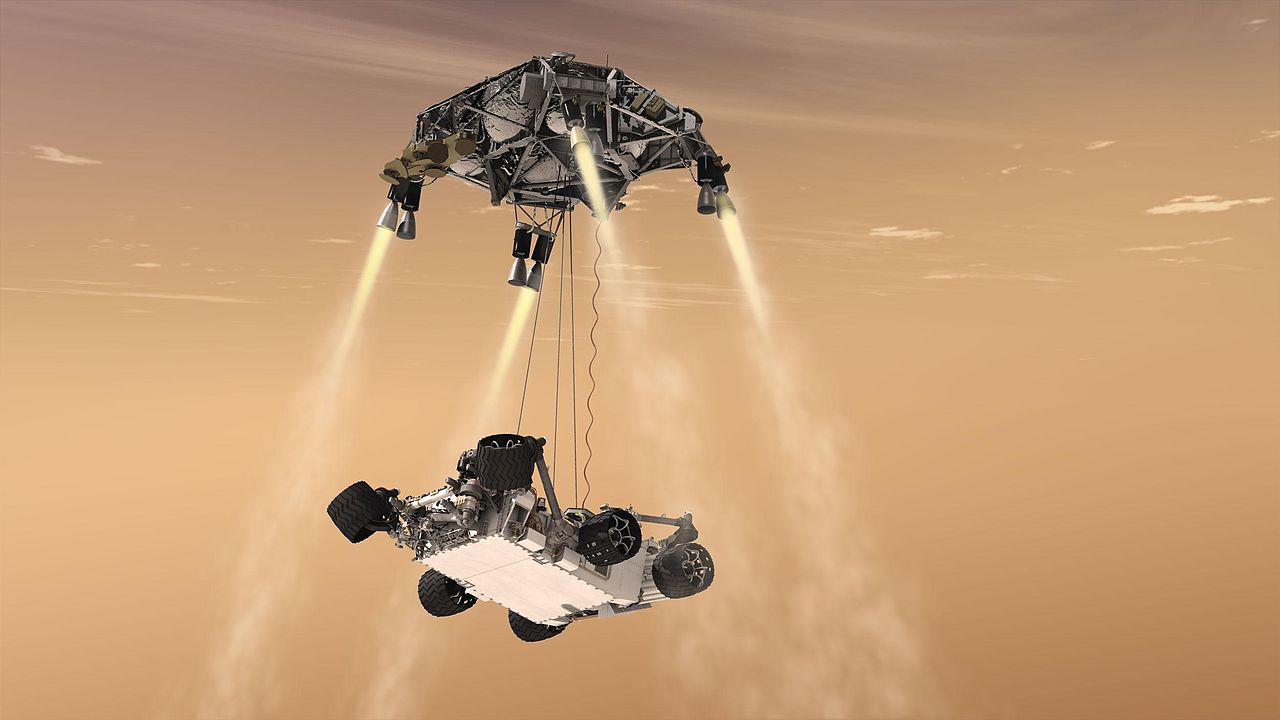  This artist's concept shows the sky crane maneuver during the descent of NASA's Curiosity rover to the Martian surface. The entry, descent, and landing (EDL) phase of the Mars Science Laboratory mission begins when the spacecraft reaches the Martian...