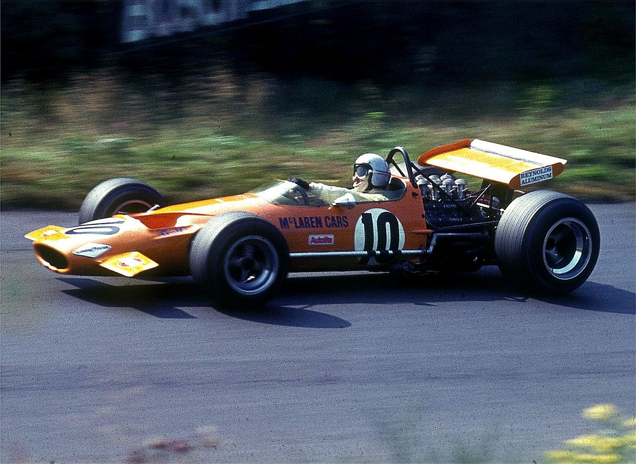 The M7 car of 1968 gave McLaren their first Formula One wins. It is driven here by Bruce McLaren at the Nürburgring in 1969.
