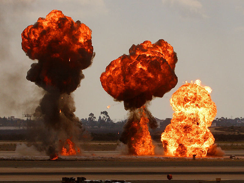 Gasoline explosions, simulating bomb drops at an airshow.