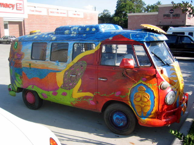 A VW Combi decorated by hippies.