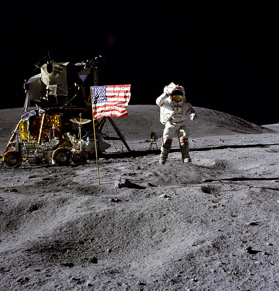 John W. Young on the Moon during Apollo 16 mission. Charles M. Duke Jr. took this picture. The LM Orion is on the left. April 21, 1972