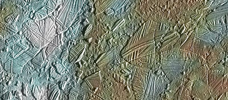 View of a small region of the thin, disrupted, ice crust in the Conamara region of Jupiter's moon Europa showing the interplay of surface color with ice structures. The white and blue colors outline areas that have been blanketed by a fine dust of ice.