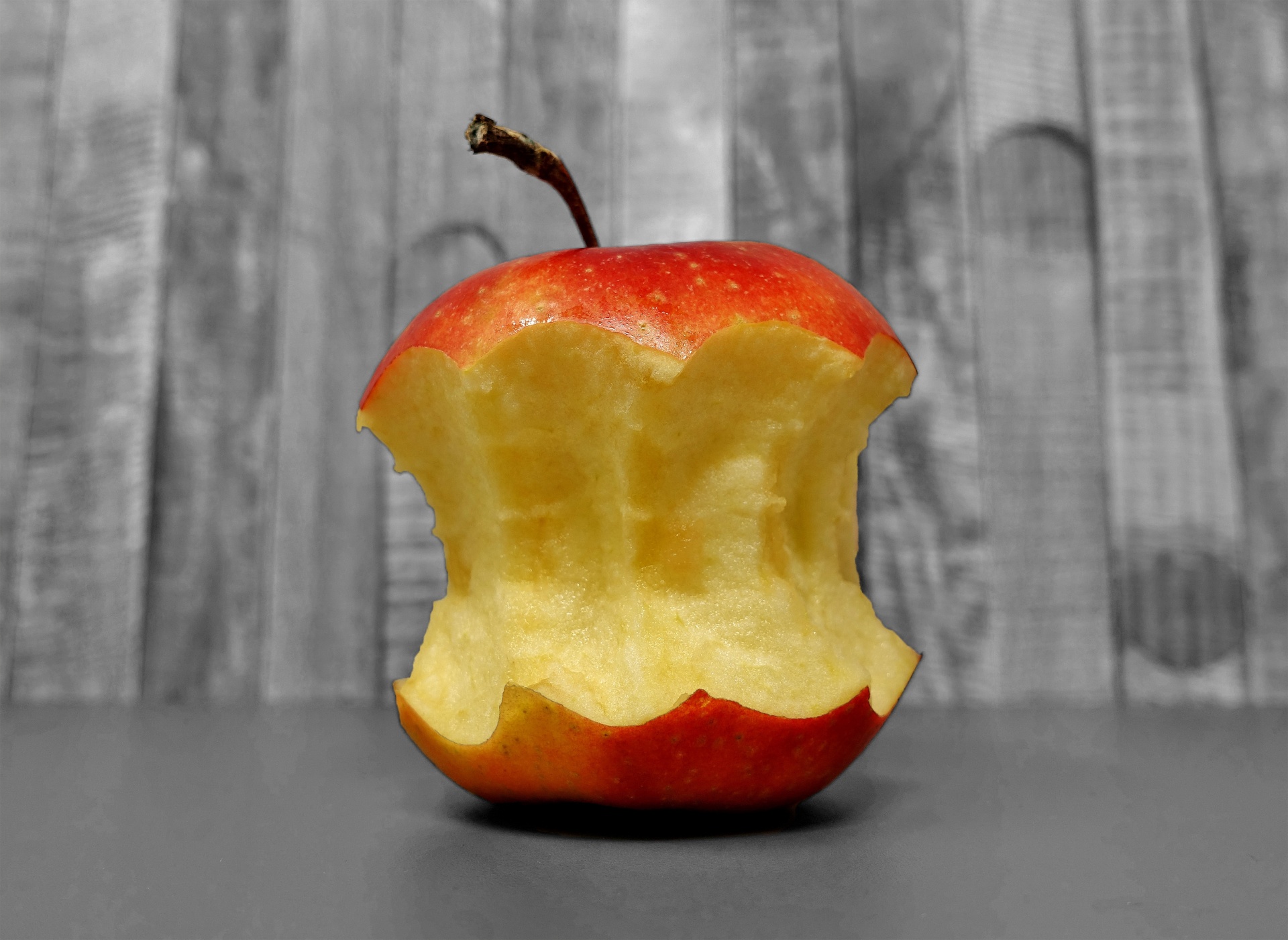 An apple, part-eaten