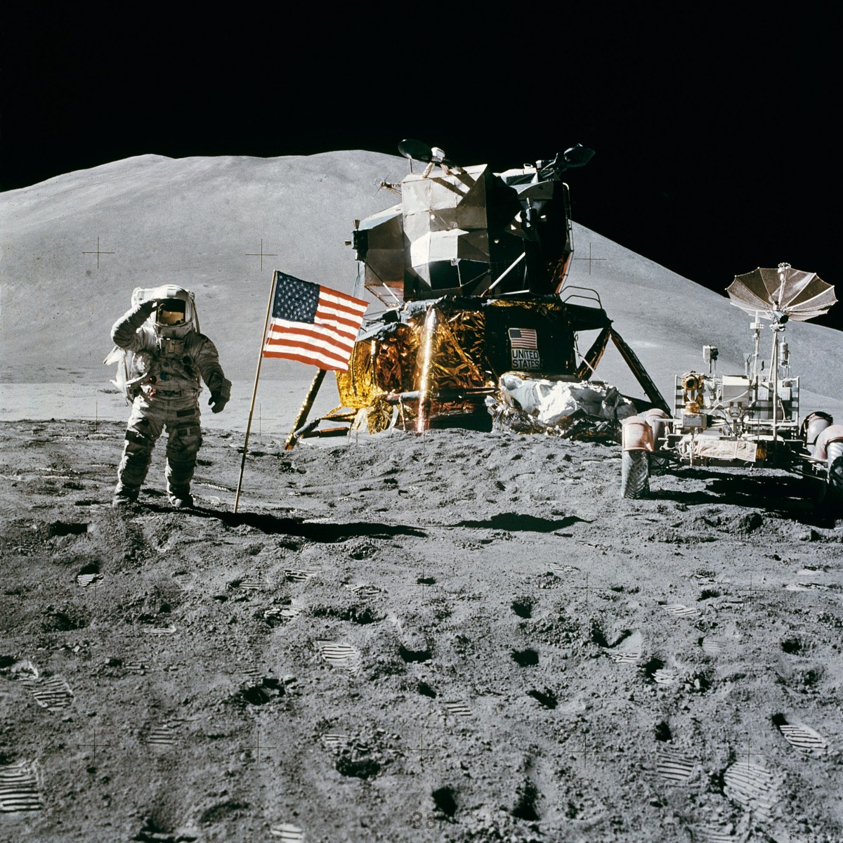  Apollo 15 Lunar Module Pilot James Irwin salutes the U.S. flag. Astronaut James B. Irwin, lunar module pilot, gives a military salute while standing beside the deployed U.S. flag during the Apollo 15 lunar surface extravehicular activity (EVA) at the...