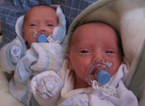 Baby identical twins - they may share the same genes, but which ones are active?