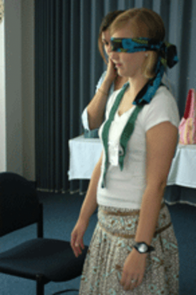  Marine Corps Base Camp Lejeune, North Carolina - Military spouses enhance communication skills by conducting an exercise involving finding objects in a room while blindfolded as part of an \In the Midst\ workshop sponsored by Marine Corps Family Team...