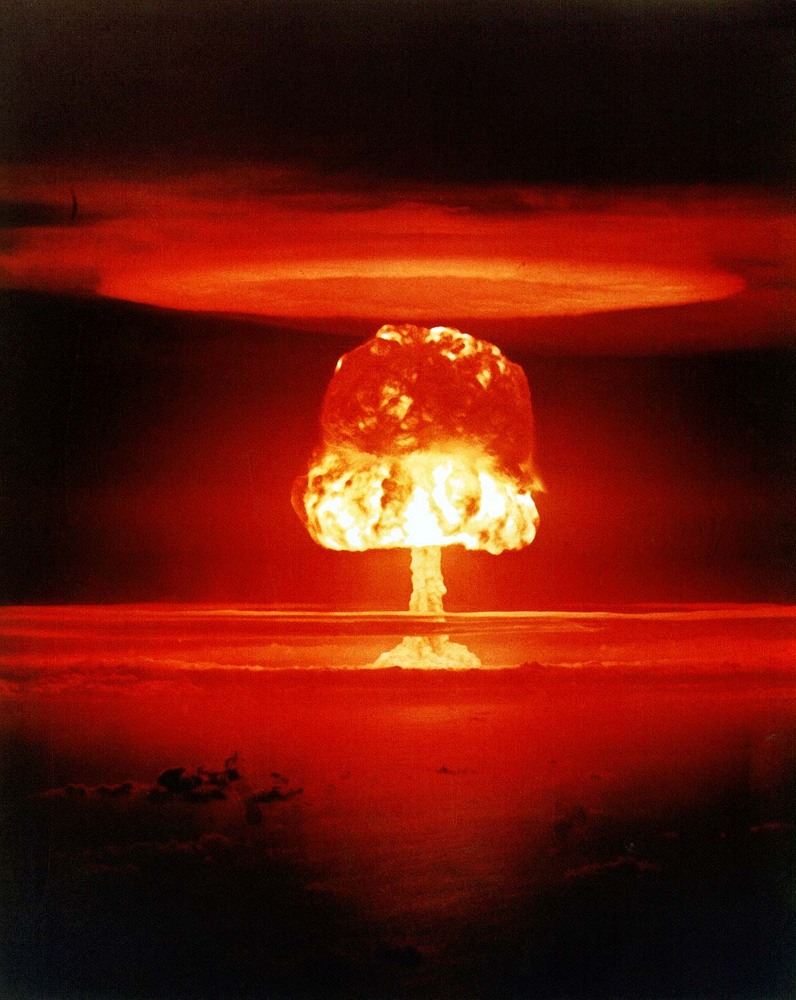 Nuclear weapon test Romeo (yield 11 Mt) on Bikini Atoll. The test was part of the Operation Castle. Romeo was the first nuclear test conducted on a barge. The barge was located in the Bravo crater.