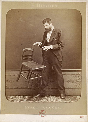  French spirit photographer Édouard Isidore Buguet (1840-1901) demonstrates telekinesis in this hoaxed 1875 photograph titled Fluidic Effect. Buguet was arrested the same year for faking his ghost photographs and he served a year in prison. [1] The...