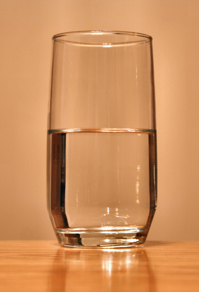 A glass of water, demonstrating the eternal conundrum of whether the glass is half full or half empty.