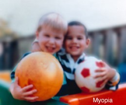 Human eyesight - two children and ball with myopia short-sightedness