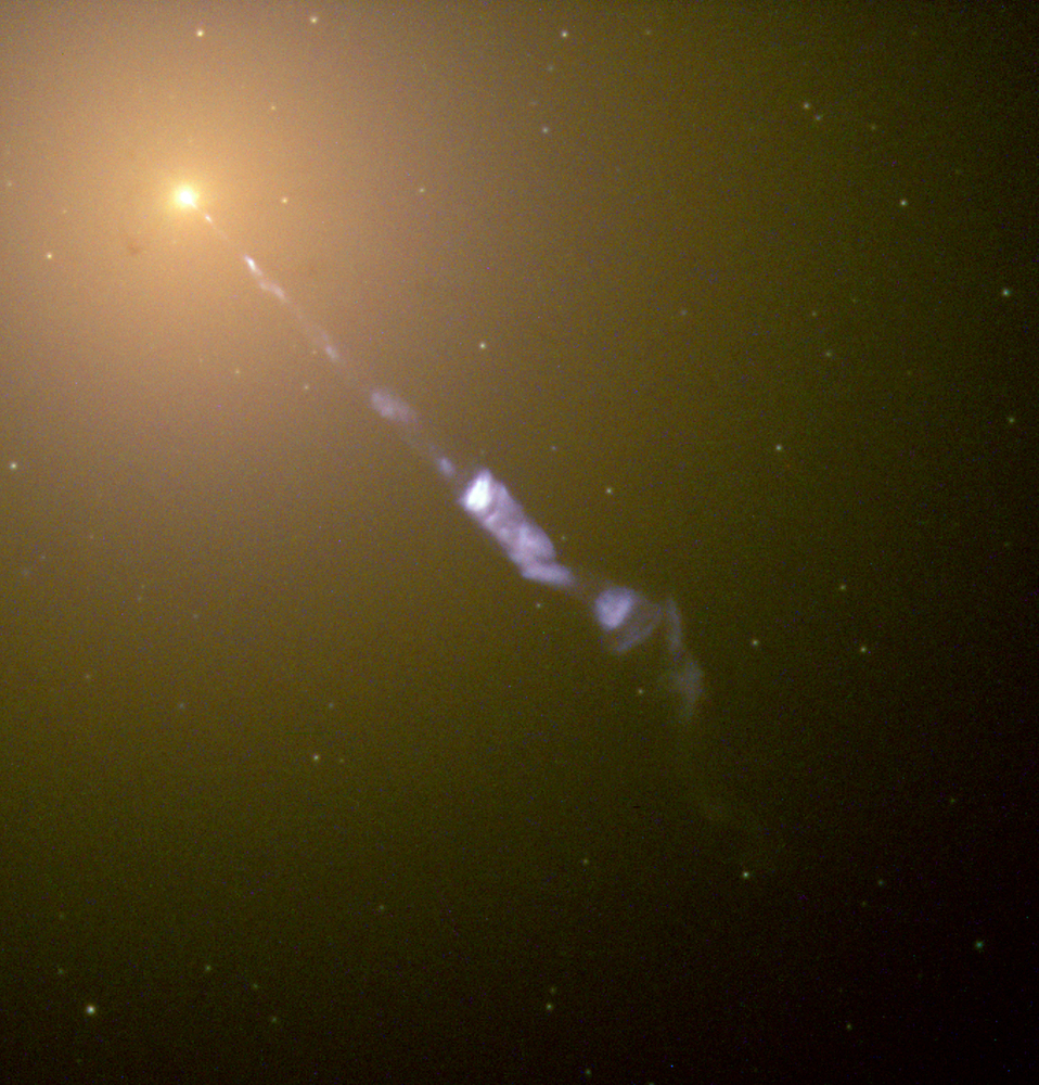  Streaming out from the center of the galaxy M87 like a cosmic searchlight is one of nature's most amazing phenomena, a black-hole-powered jet of electrons and other sub-atomic particles traveling at nearly the speed of light. In this Hubble telescope...