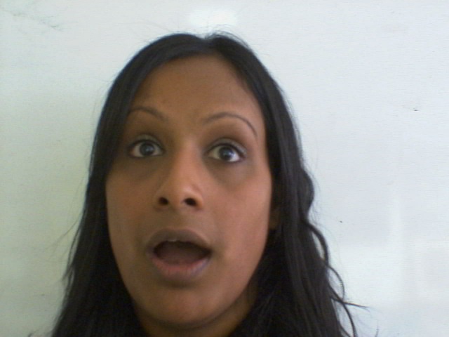 Meera looking surprised
