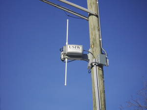 A photograph of a metro Wi-Fi antenna in Minneapolis, MN. Antennas like these are placed across a metro area to create a wireless mesh network.