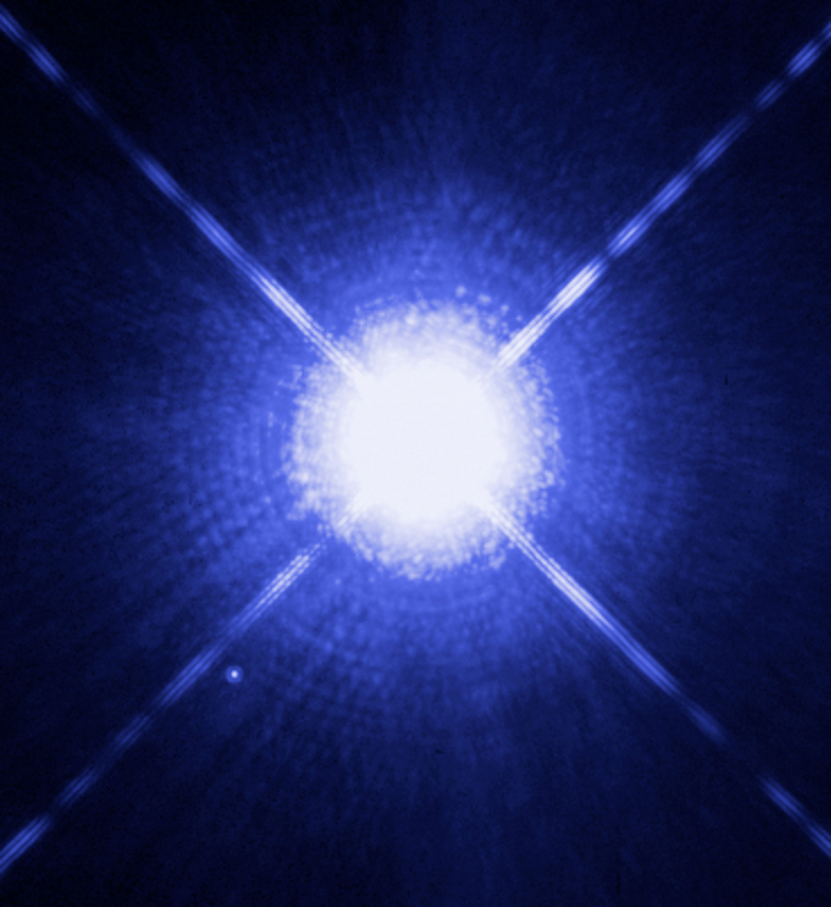  This Hubble Space Telescope image shows Sirius A, the brightest star in our nighttime sky, along with its faint, tiny stellar companion, Sirius B. Astronomers overexposed the image of Sirius A [at centre] so that the dim Sirius B [tiny dot at lower...