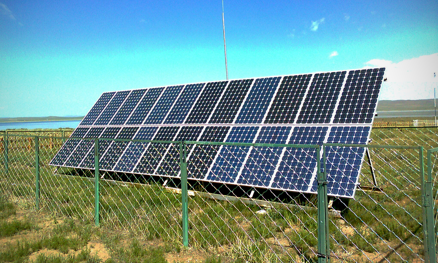 Solar panel installation at an information center adjacent to Ögii Lake