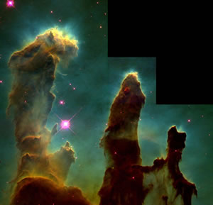 Figure 2: The Eagle Nebula. On 1 April 1995, the Hubble took this famous photograph of pillar-like structures in the Eagle Nebula. These pillars are actually columns of interstellar hydrogen gas and dust that lead to star formation. (Image Paul Scowen (Arizona State University) and NASA / ESA)
