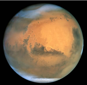 Figure 3: Mars. This image illustrates the amount of detail that can be generated from the Hubble telescope. It captures details only 16 km across, even though it is operating at 68 million km from the planet.