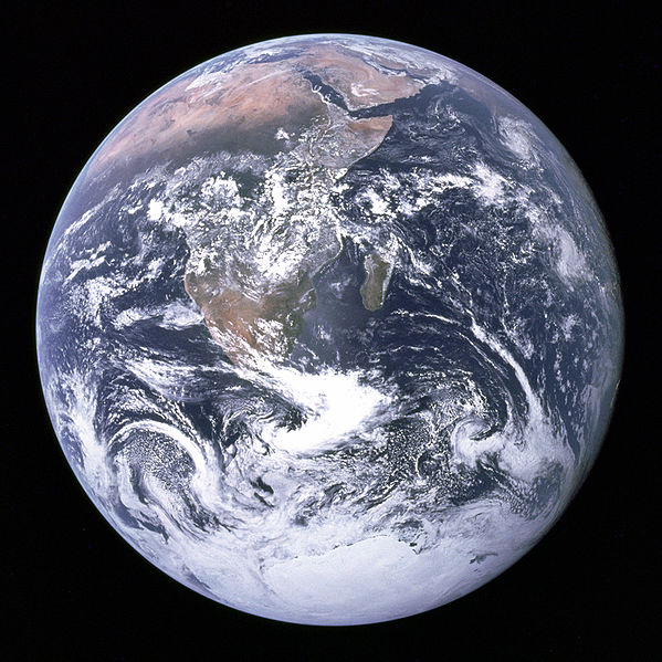 "The Blue Marble" is a famous photograph of the Earth taken on December 7, 1972, by the crew of the Apollo 17 spacecraft en route to the Moon at a distance of about 29,000 kilometres (18,000 mi). It shows Africa, Antarctica, and the Arabian Peninsula.
