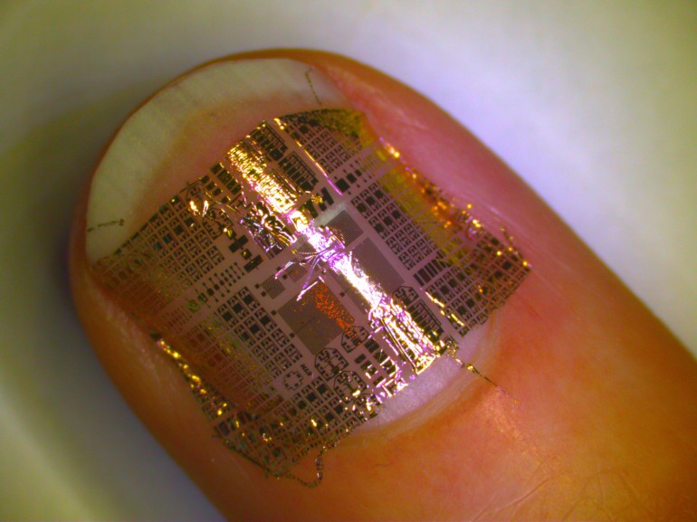 Wafer-thin electronics that can be wrapped around a human hair or even implanted into a contact lens for medical monitoring