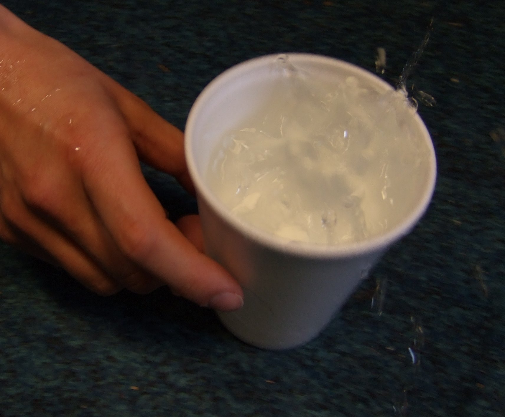 Water droplets start to fly off