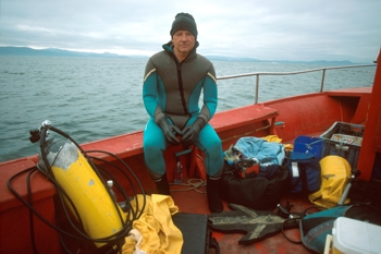 Marine engineer and underwater photographer Klaus Jost preparing to dive