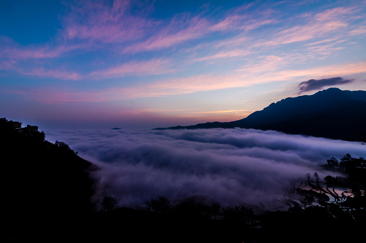 A view of low clouds and mountain ranges in China's Yunnan province.