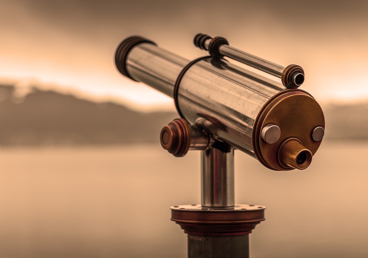 A telescope with a sepia filter over the image