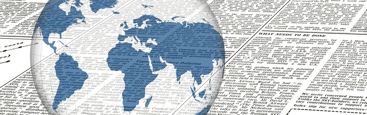 image of a newspaper and a globe