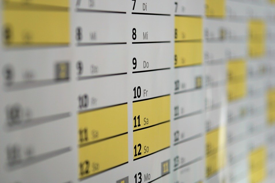 A close up of a wall calendar