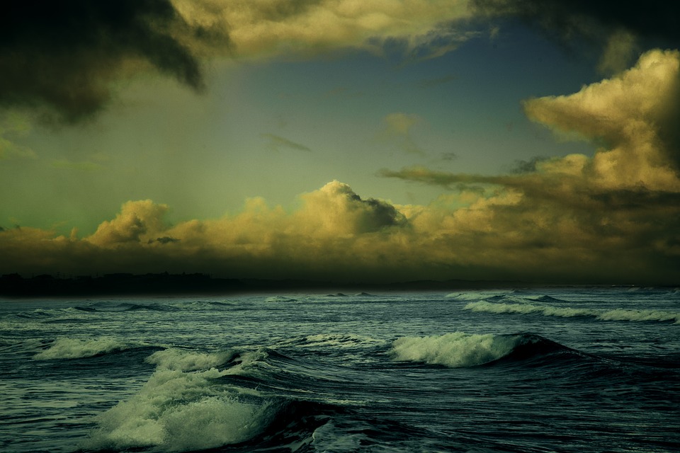 Looking out to sea, dark clouds on the horizon