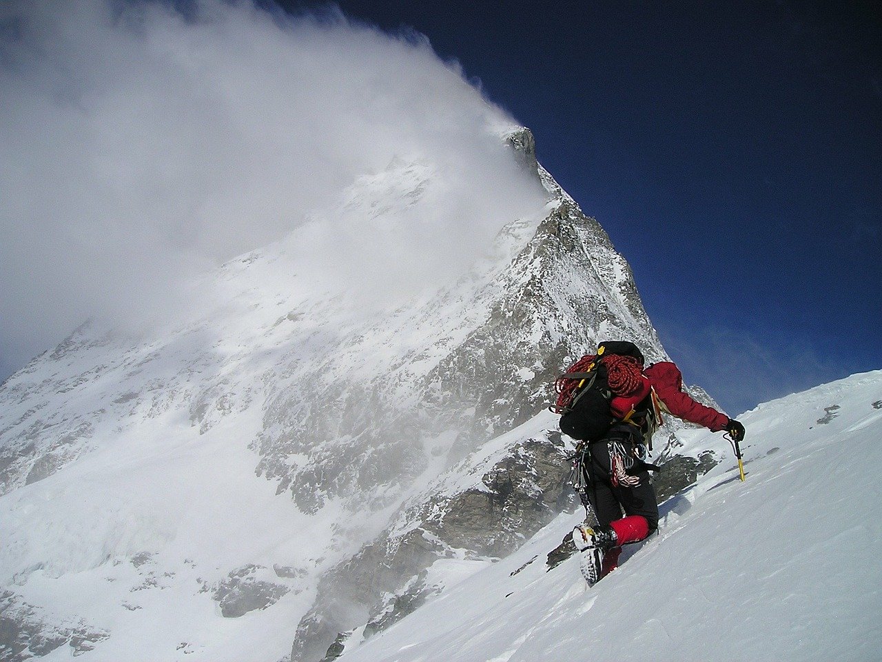 Someone climbing the Matterhorn.