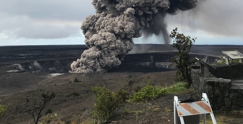 Ash column rises from the Overlook crater at the summit of Kīlauea Volcano. HVO's interpretation is that the explosion was triggered by a rockfall from the steep walls of Overlook crater. The photograph was taken at 8:29 a.m. HST on the 10th May from the 