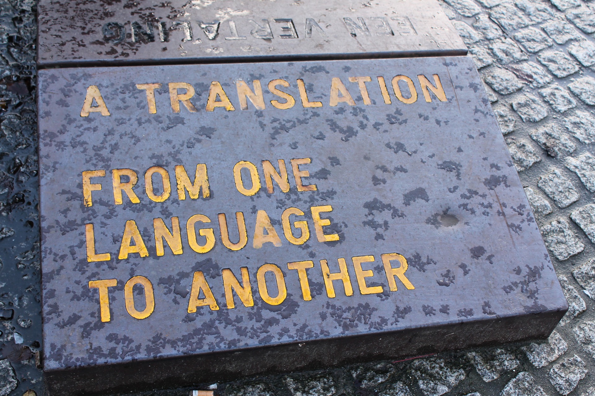 Slab inscribed with a translation