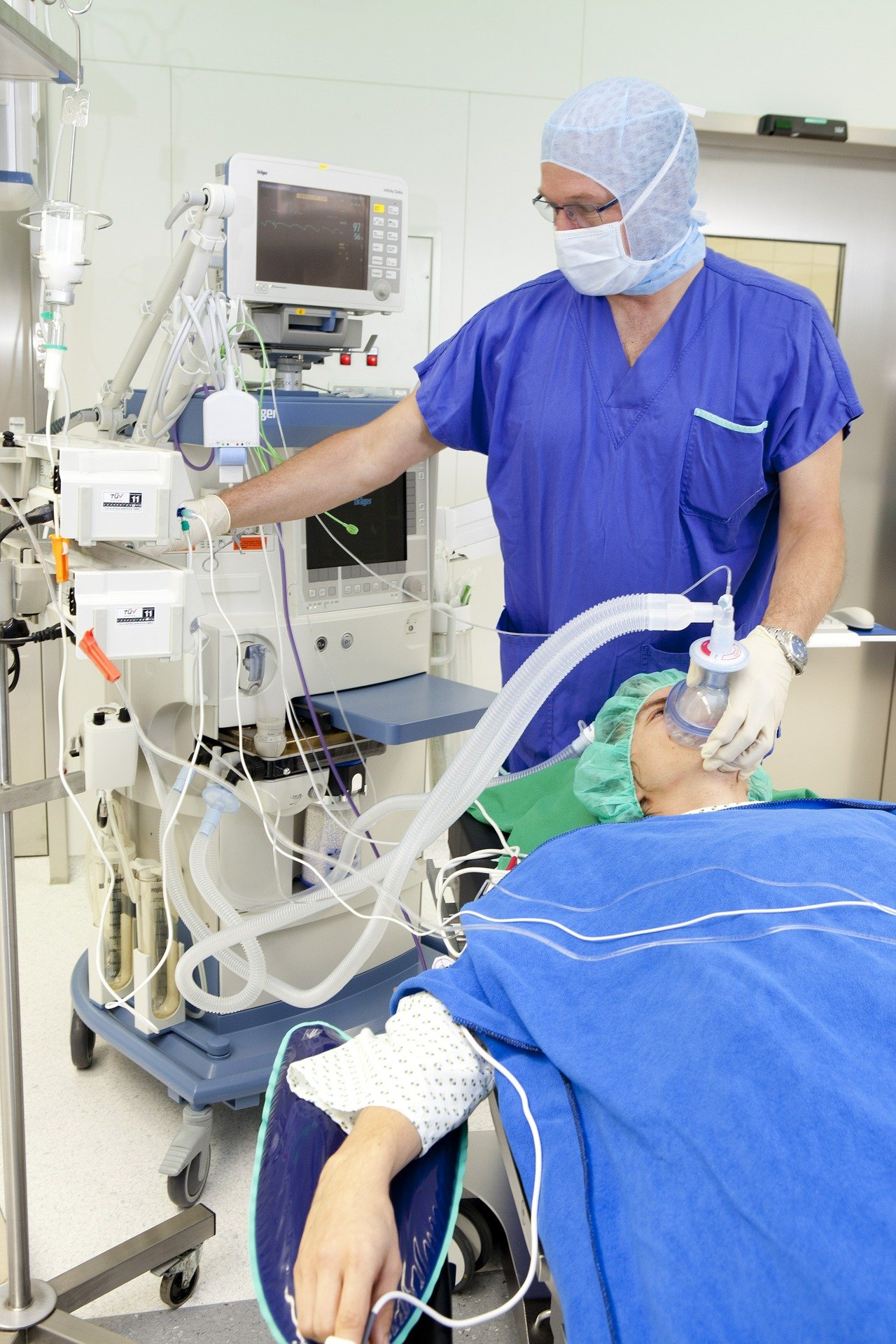 A patient on a ventilator in a hospital.