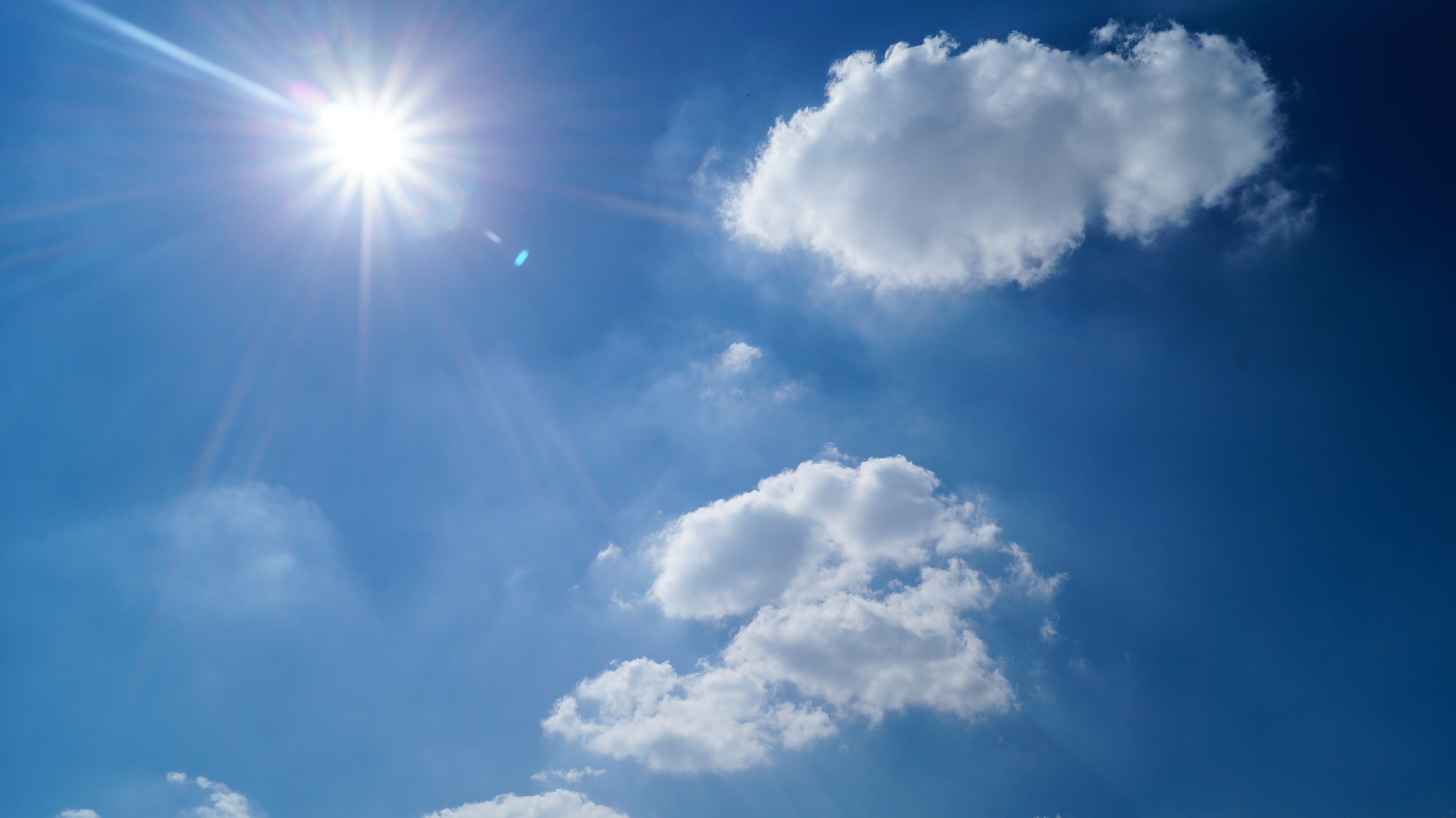 Bright sun in a blue sky
