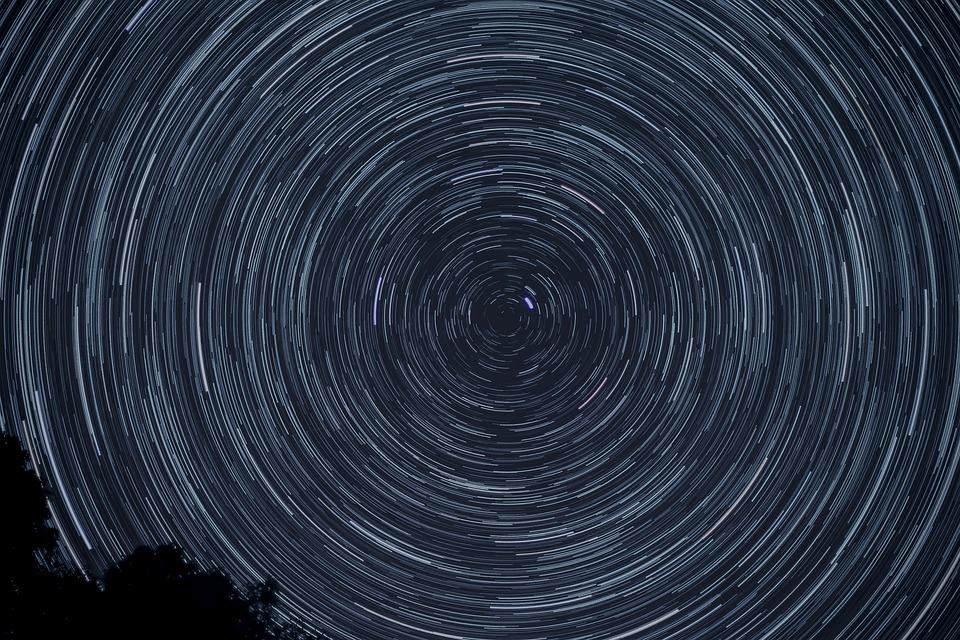 Star trails photographed at night with a long exposure