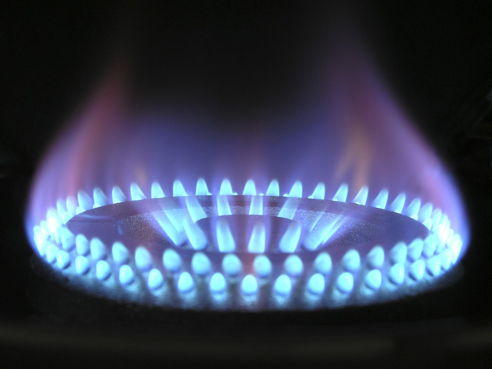 A Close up of a lit gas burner cooker
