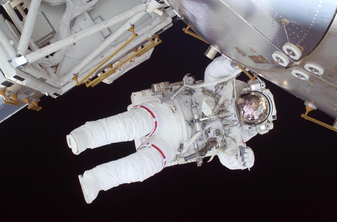 Nicole Stott spacewalks from the International Space Station