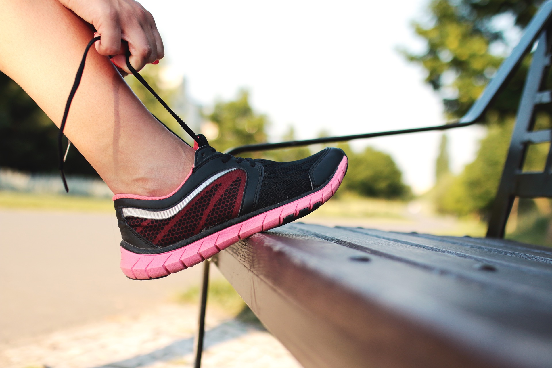 Athlete lacing up trainers