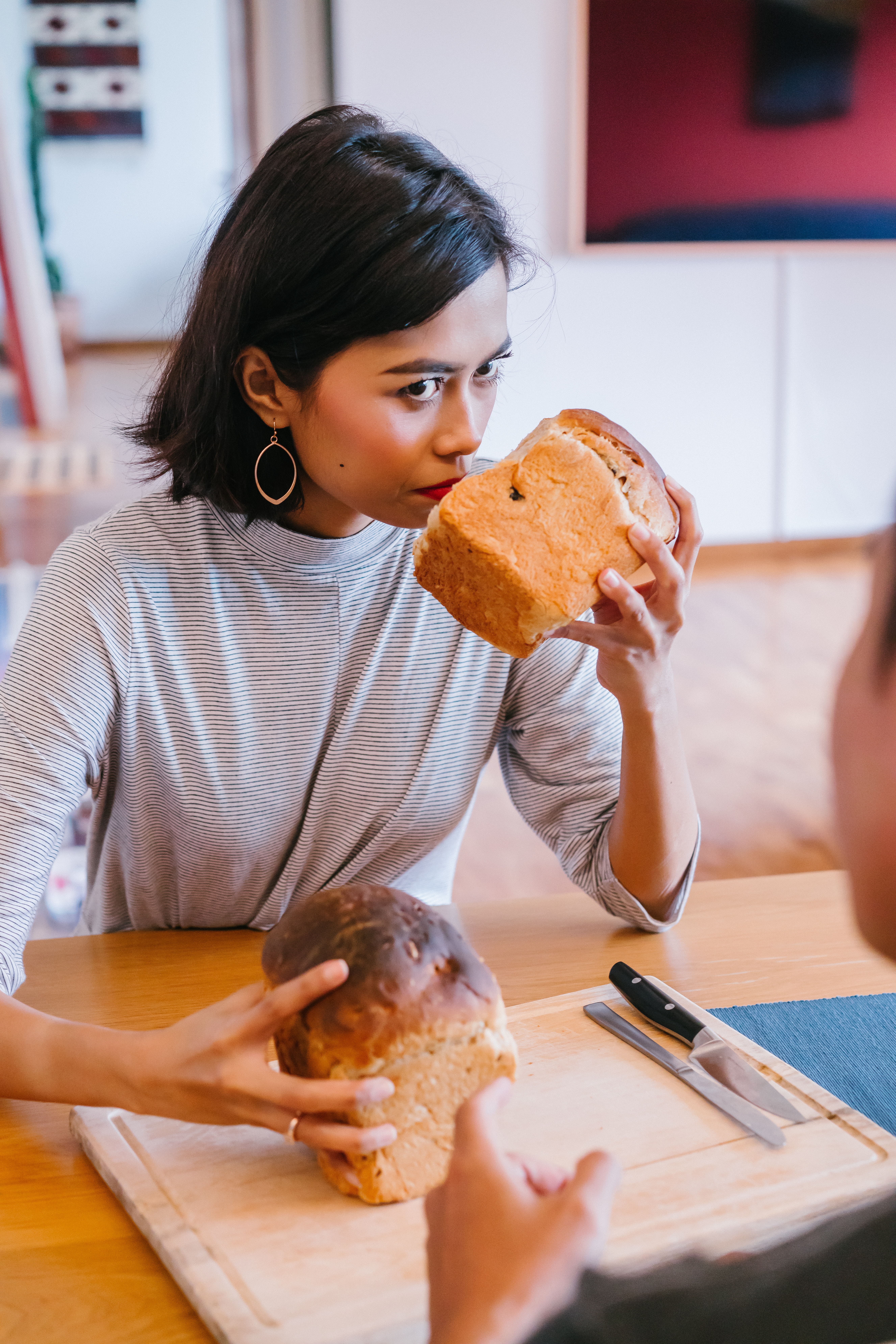 woman smelling bread