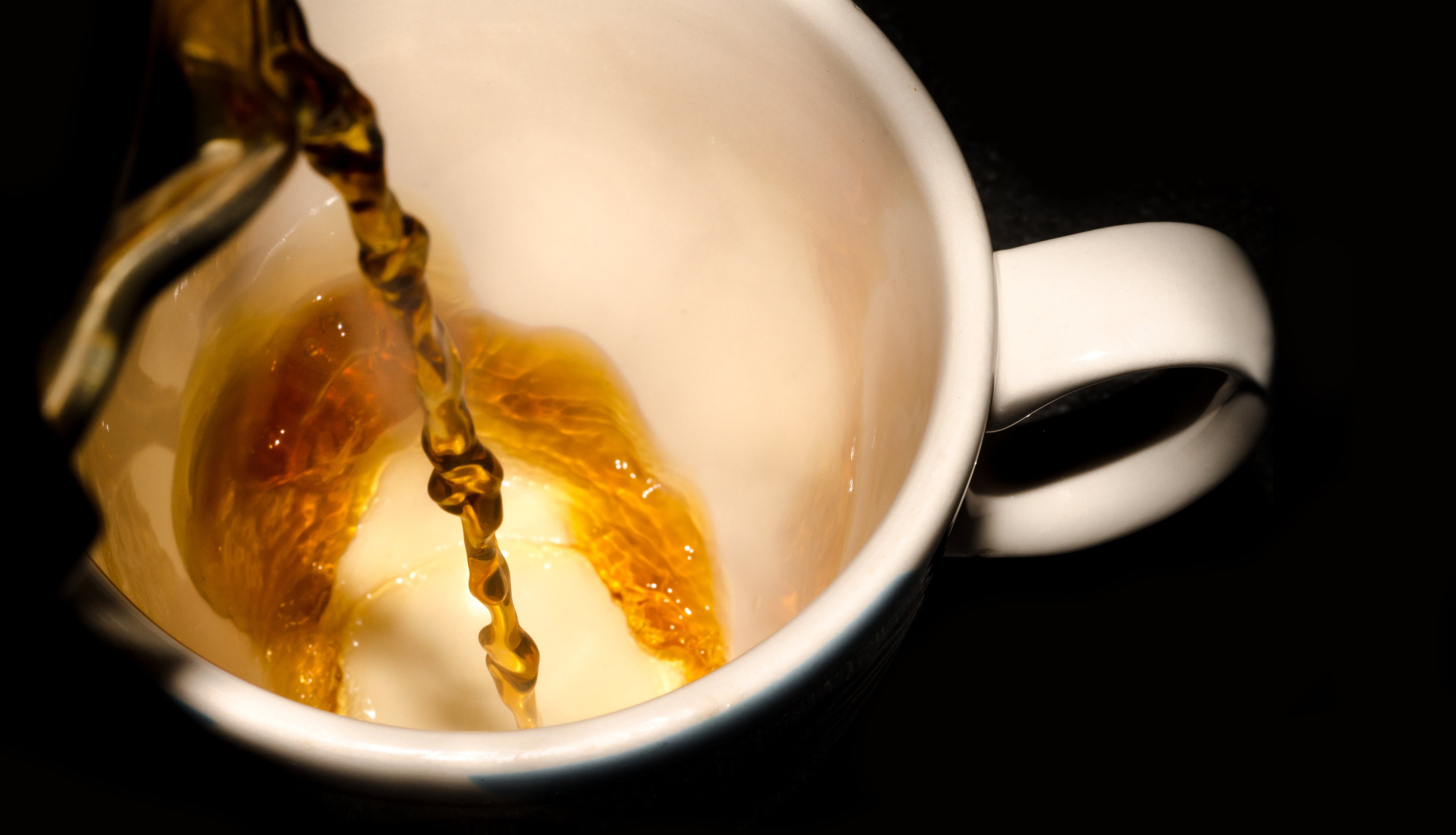 Pouring a mug of tea