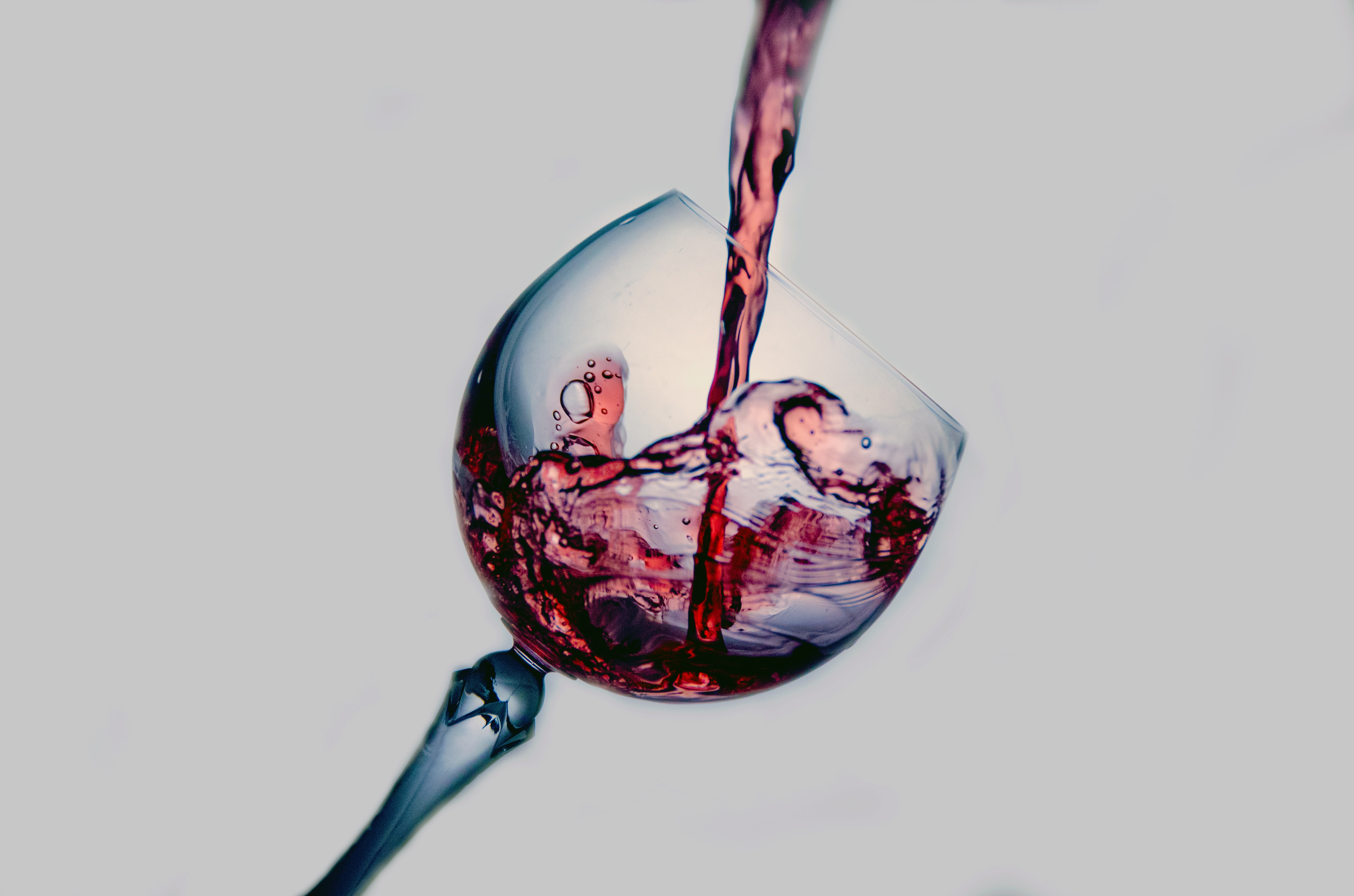 Pouring a glass of red wine