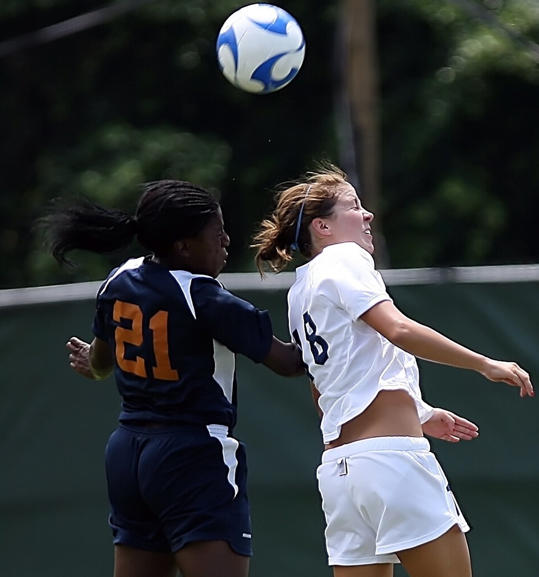 photo of women playing football