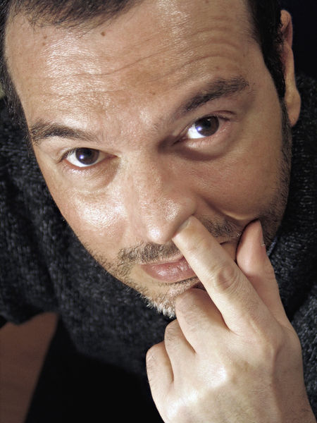 A person picking his nose