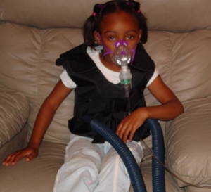 An example of a breathing treatment for a younger Cystic fibrosis patient.