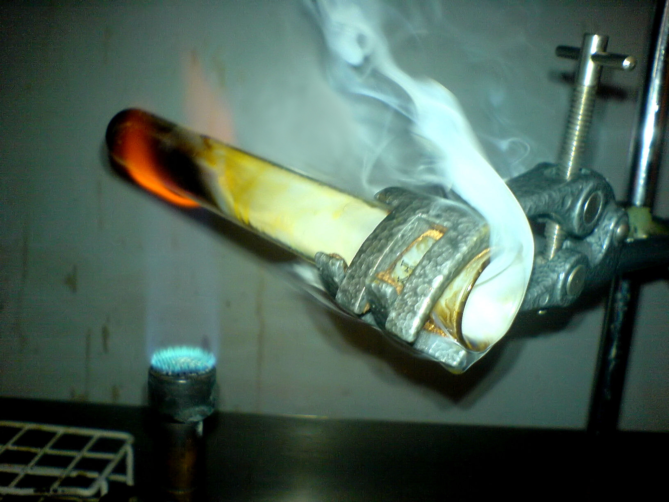 Test tube over bunsen burner.