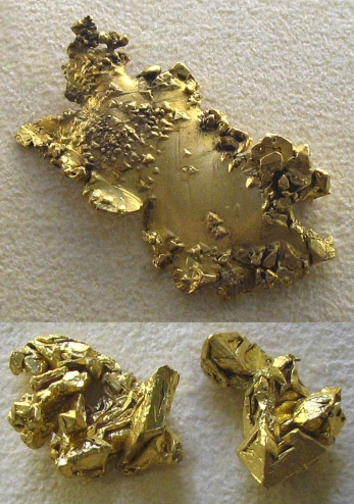  A collage of 2 photos, showing 3 pieces of native gold. The top piece is from the Washington mining district, California, and the bottom two are from Victoria, Australia. The bottom 2 pieces illustrate octahedral formations. The photos were taken at...