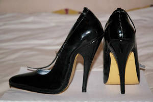 A pair of high heeled shoe with 12cm stiletto heels