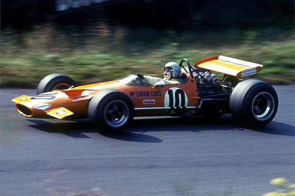 The M7 car of 1968 gave McLaren their first Formula One wins. It is driven here by Bruce McLaren at the Nürburgring in 1969.